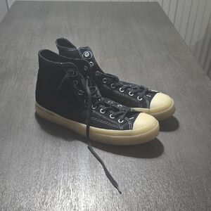 Converse Chuck 70 Black Suede and Cream High-Top Sneakers.